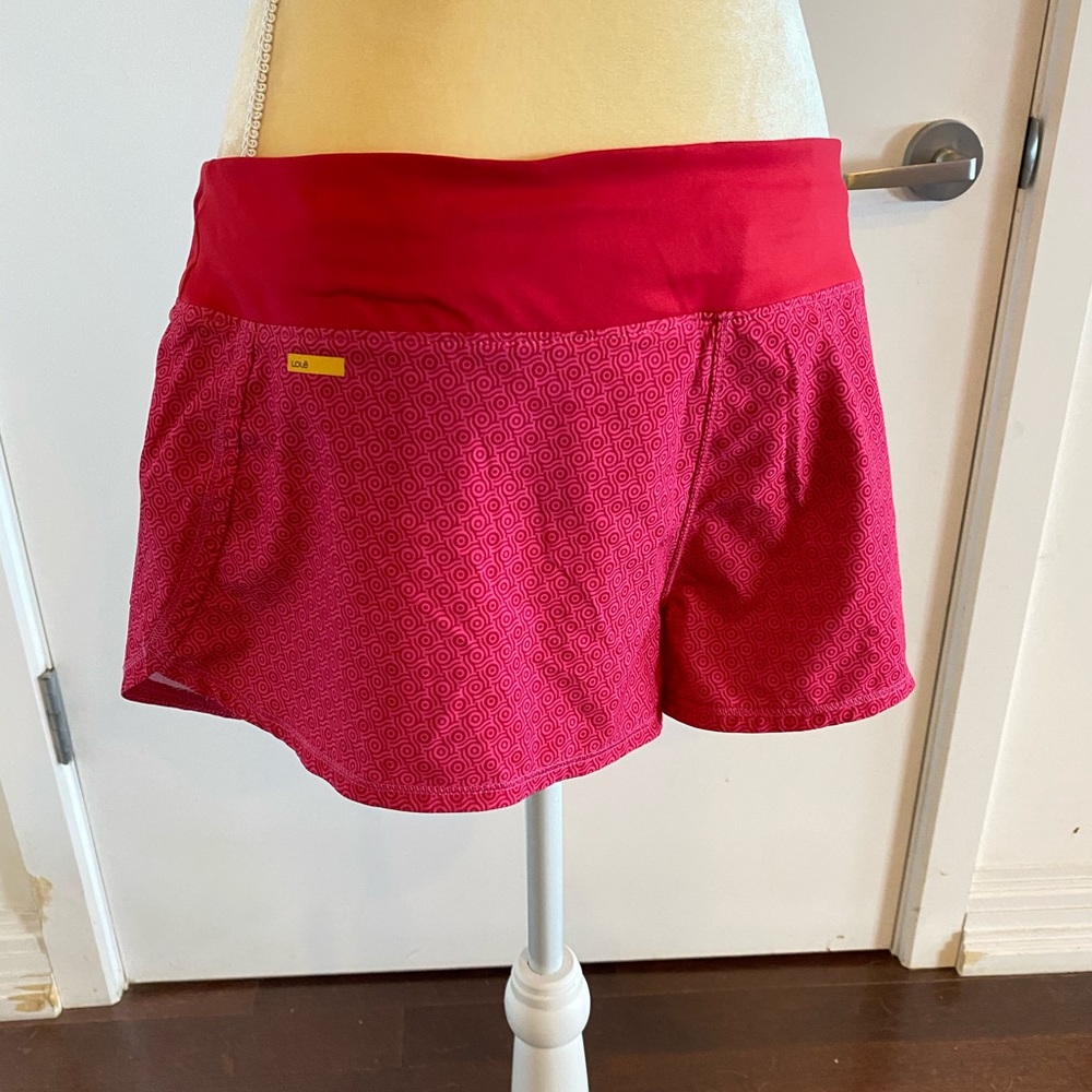 Löle hot pink running shorts